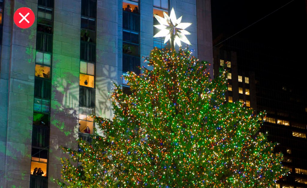 The 74-foot-tall Rockefeller Center Christmas tree is lit using 30,000 energy efficient LED lights during the 79th annual lighting ceremony, in New York, Wednesday, Nov. 30, 2011. (AP Photo/Charles Sykes)