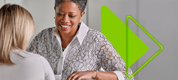 PH_Pic_AudTechHCPWithPatientShowingPhone-EmailBanner_600x320-2